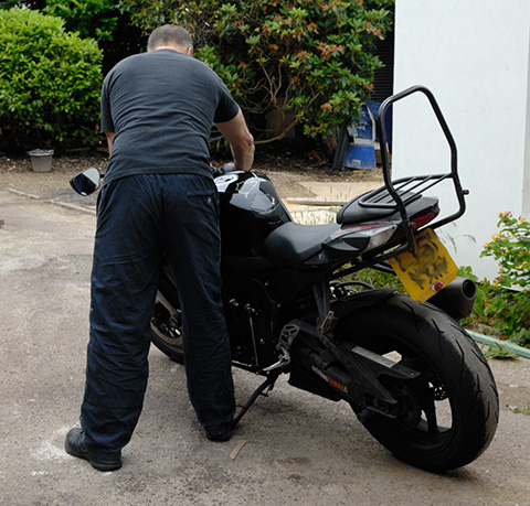 Step in close and get a good grip of the bars