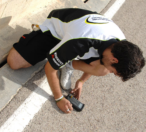 Measuring the track tempertaure is just part of the setup engineer's job over race weekend...