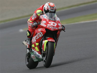 Marco Melandri didn't win this time, but on his supposedly inferior satellite bike he tied up the manufacturer's title for Honda for the record 17th time...