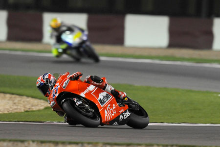 Casey Stoner shows a clean rear slick to a distant Rossi...