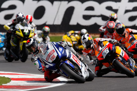 Right at the beginning. Lorenzo leads Pedrosa and Dovizioso.