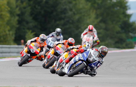 Tight at the front, entering turn 4. Stoner has just duffed Dovi up... (Pic: MotoGP)
