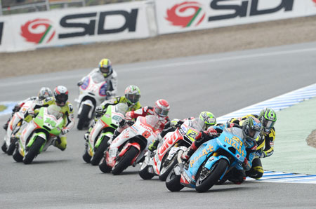 This lot carried on through virtually the whole race. Apart from de Puniet, who fell off, and Crutchlow, who pulled clear...and then fell off. (Suzuki)