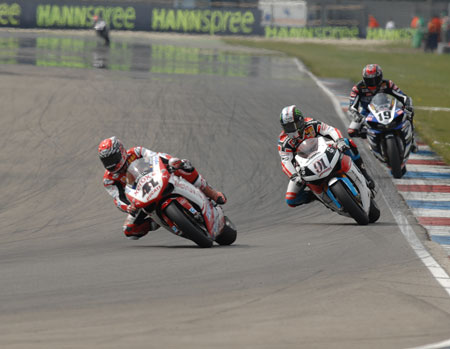 Tom Sykes is a very, very fast rider. That's him in the distance, in fourth place. NOW do you get how fast the leading group were? 