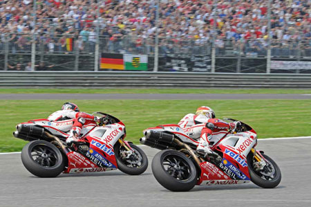 Fabrizio (nearest us) and Haga doing the old one-two... (Actually Fabrizio had mucked the corner up and haga was going down the inside...)
