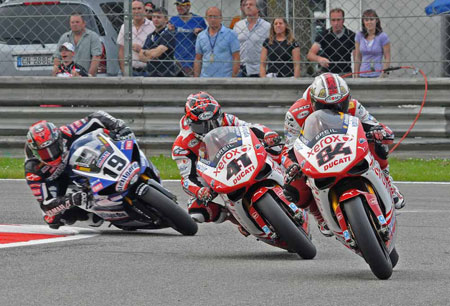 A couple of laps later - same corner, same action, different order...