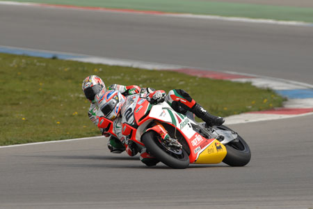 Leon Camier goes around the outside of his teammate Biaggi in Ossebroeken (the stadium) on his way to his first SBK podium