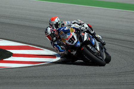 He's behind you! Leon Haslam gives Jakub Smrz and his Ducati a pillion ride. A taste of things to come for the amiable Czech, as it happens...