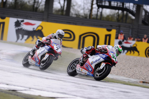 Not something you see every day. New boy leads World Champions team-mate home in the rain... (Pic: Dunk Lamont)