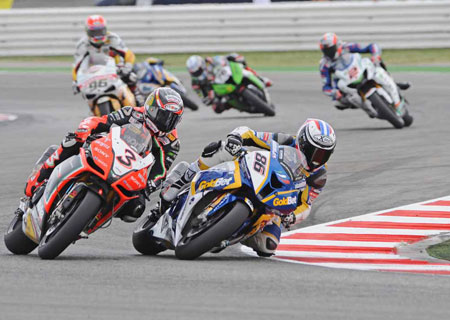 Ayrton Badovini rides hard but cleanly. Max Biaggi has to take second best this time...